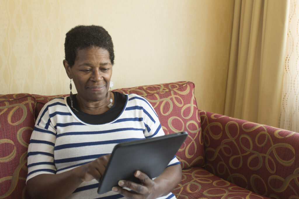 Older Woman With Tablet Computer