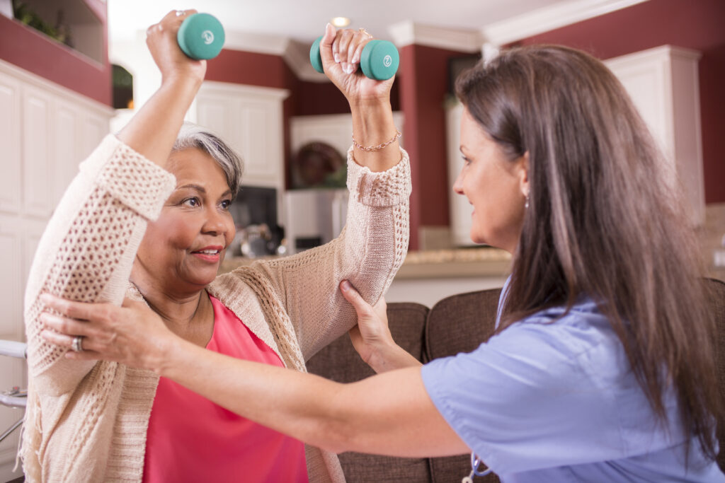 Home healthcare nurse, physical therapy with senior adult woman.