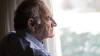 Close-up of a senior man contemplating